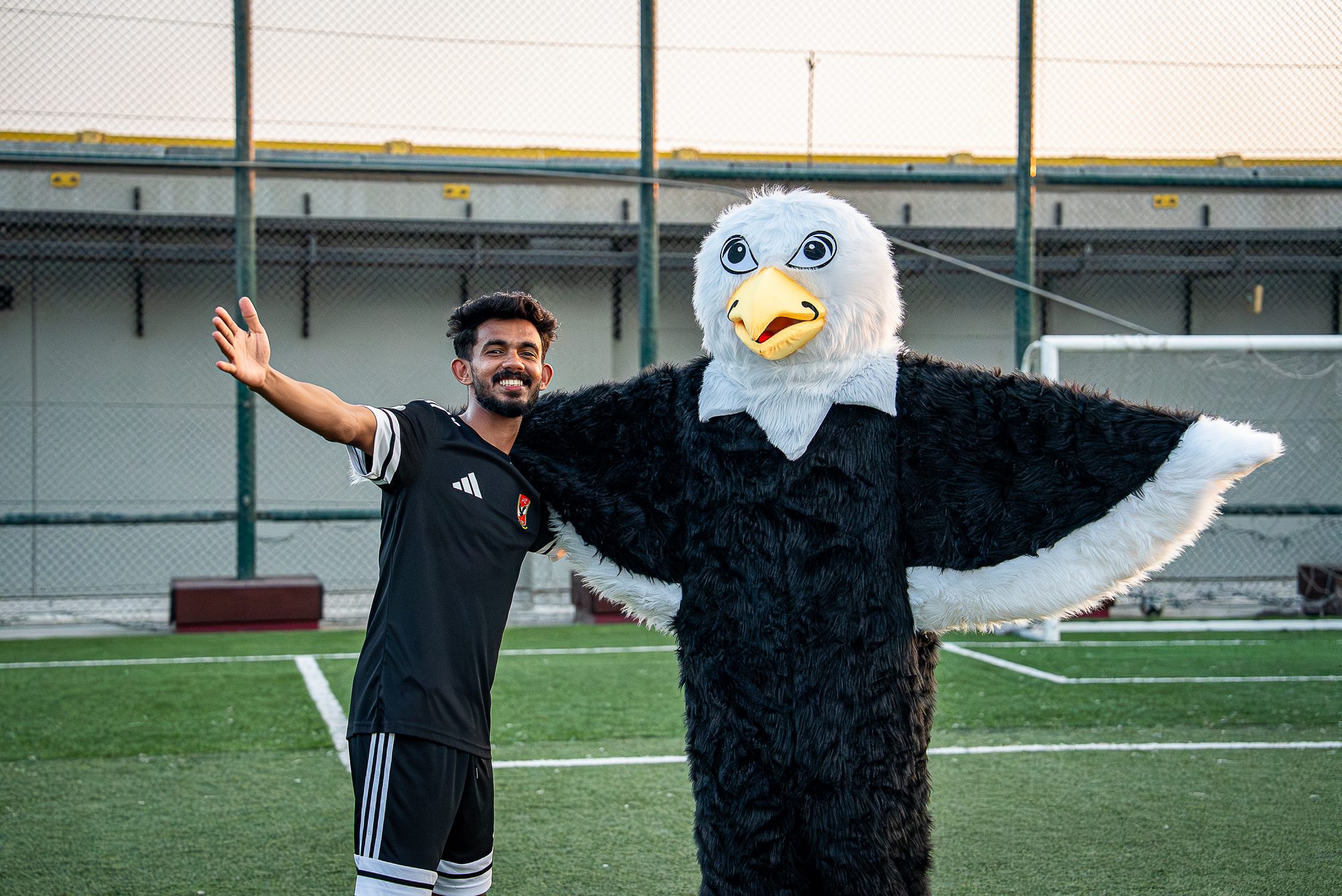 Al Ahly - player with the club mascot
