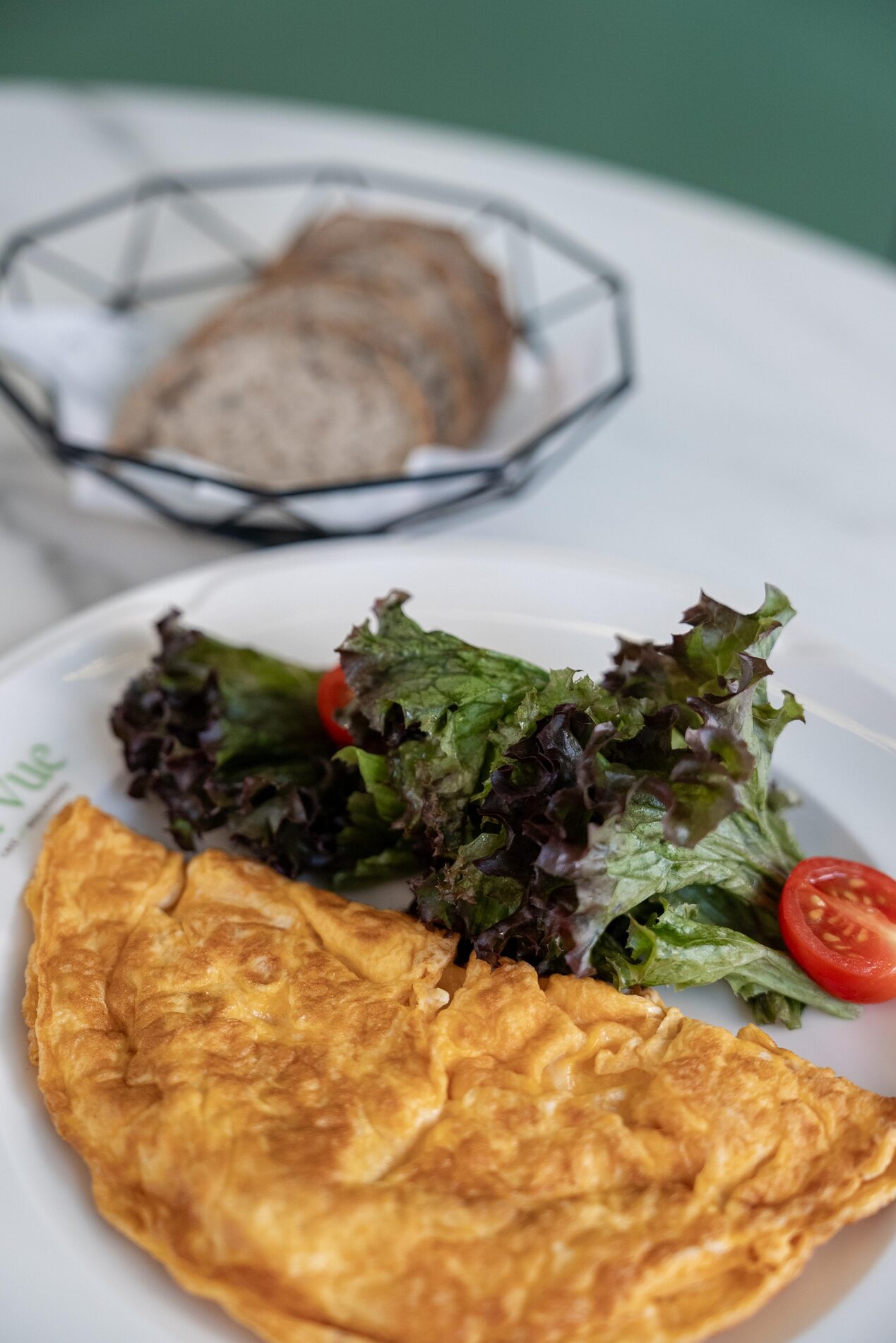 La Vue Café - bread basket and greens